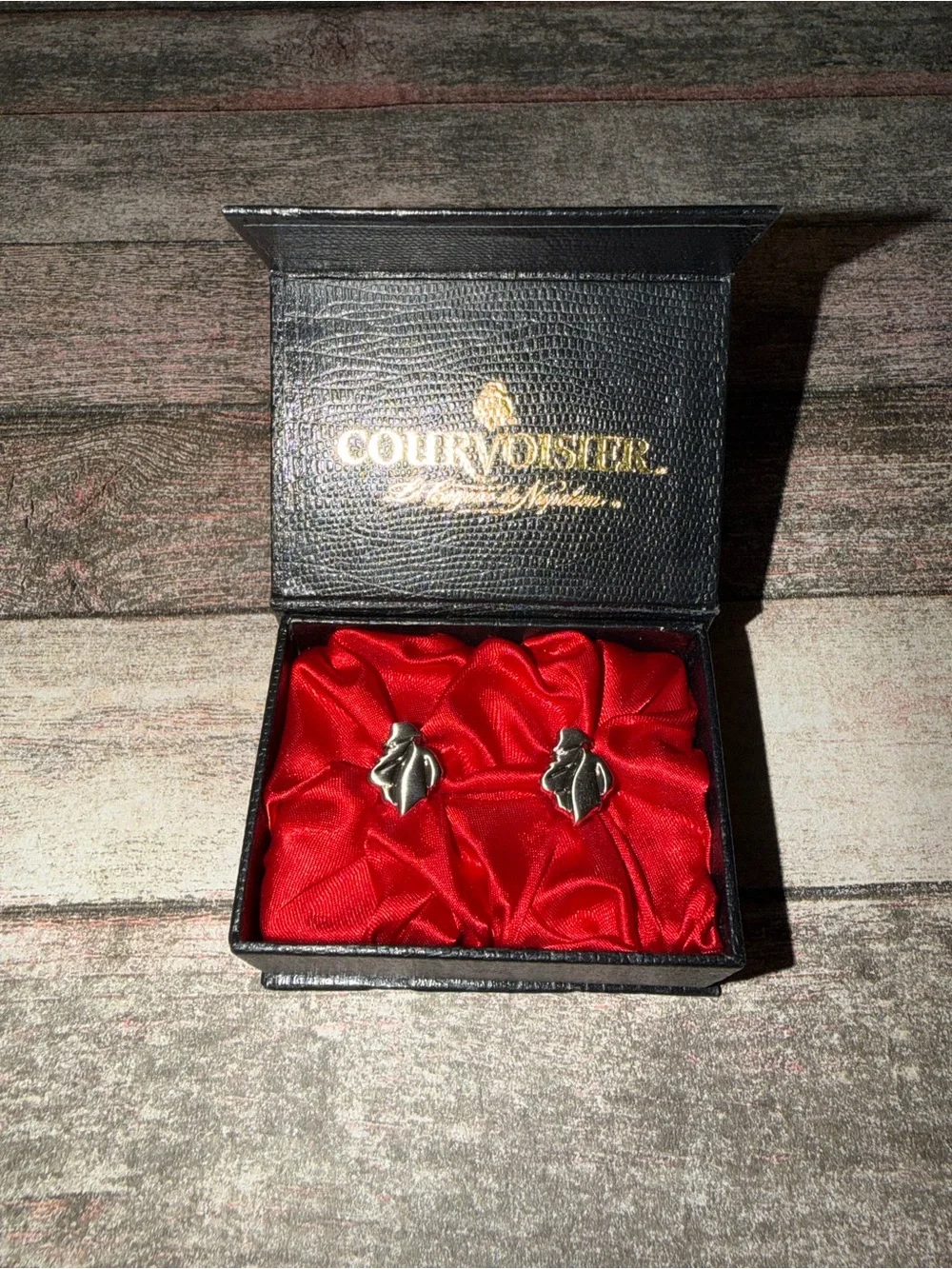 Courvoisier Silver Tone Figural Cufflinks on Red Satin